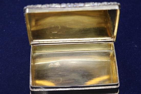 A George IV silver gilt snuff box, Nathaniel Mills, Birmingham, circa 1825 (date letter rubbed), 78mm.